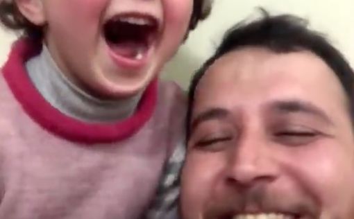 Сириец научил дочь смеяться во время взрыва бомб