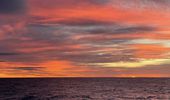 Закат солнца в Атлантическом океане: поразительные фото | Фото 1