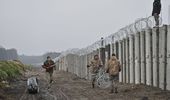 Кадр дня. Кипит работа на границе – возводят стену с Беларусью и РФ | Фото 1