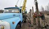 Кадр дня. Кипит работа на границе – возводят стену с Беларусью и РФ | Фото 5